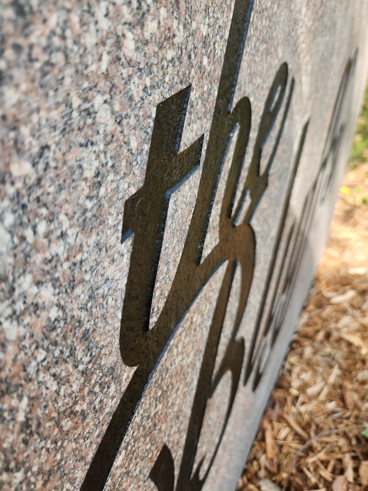 Shallow laser surface engraving on polished granite